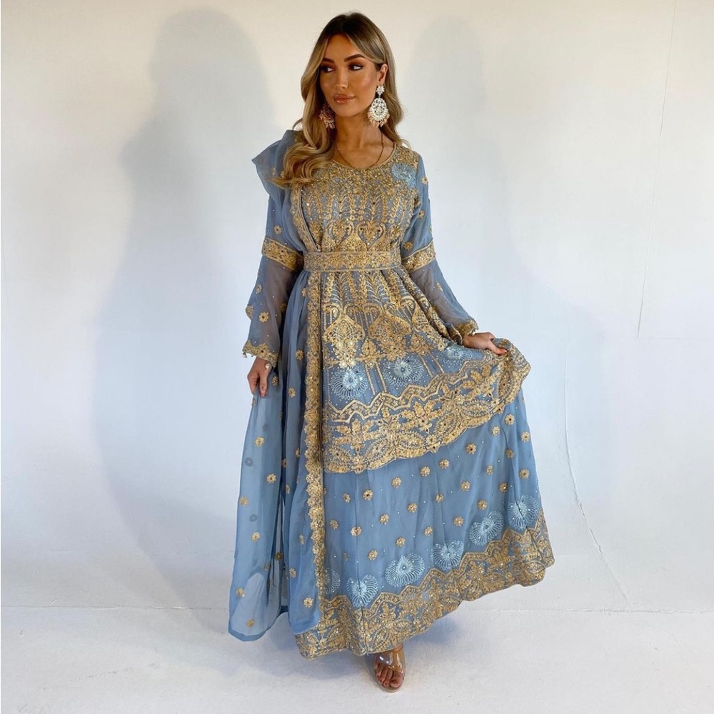 Shaadi Ki Raat in a dainty light blue and gold look,
DAANI lengha style.